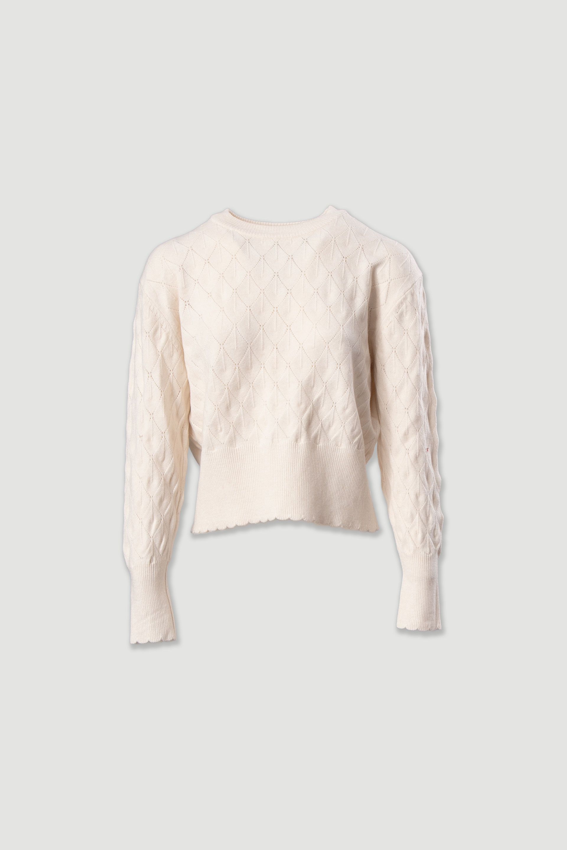 Textured knit sweater with geometric effect