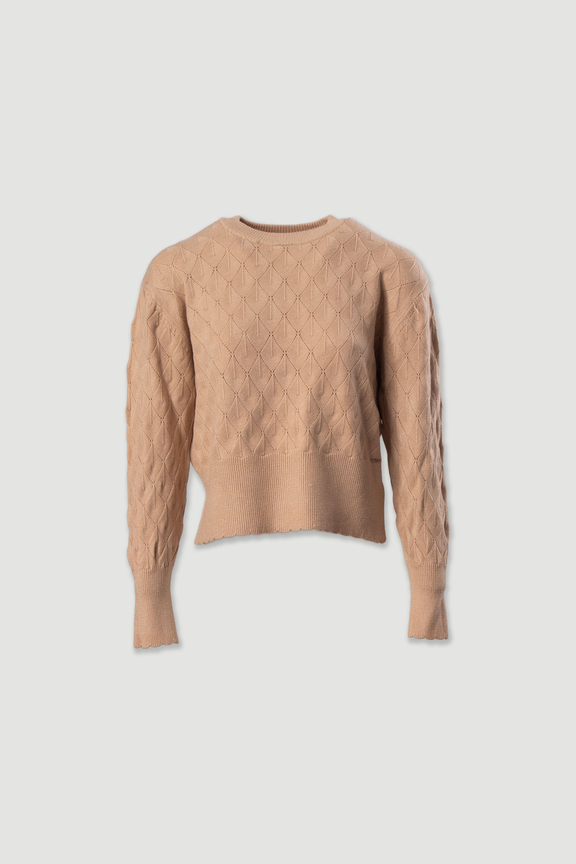 Textured knit sweater with geometric effect