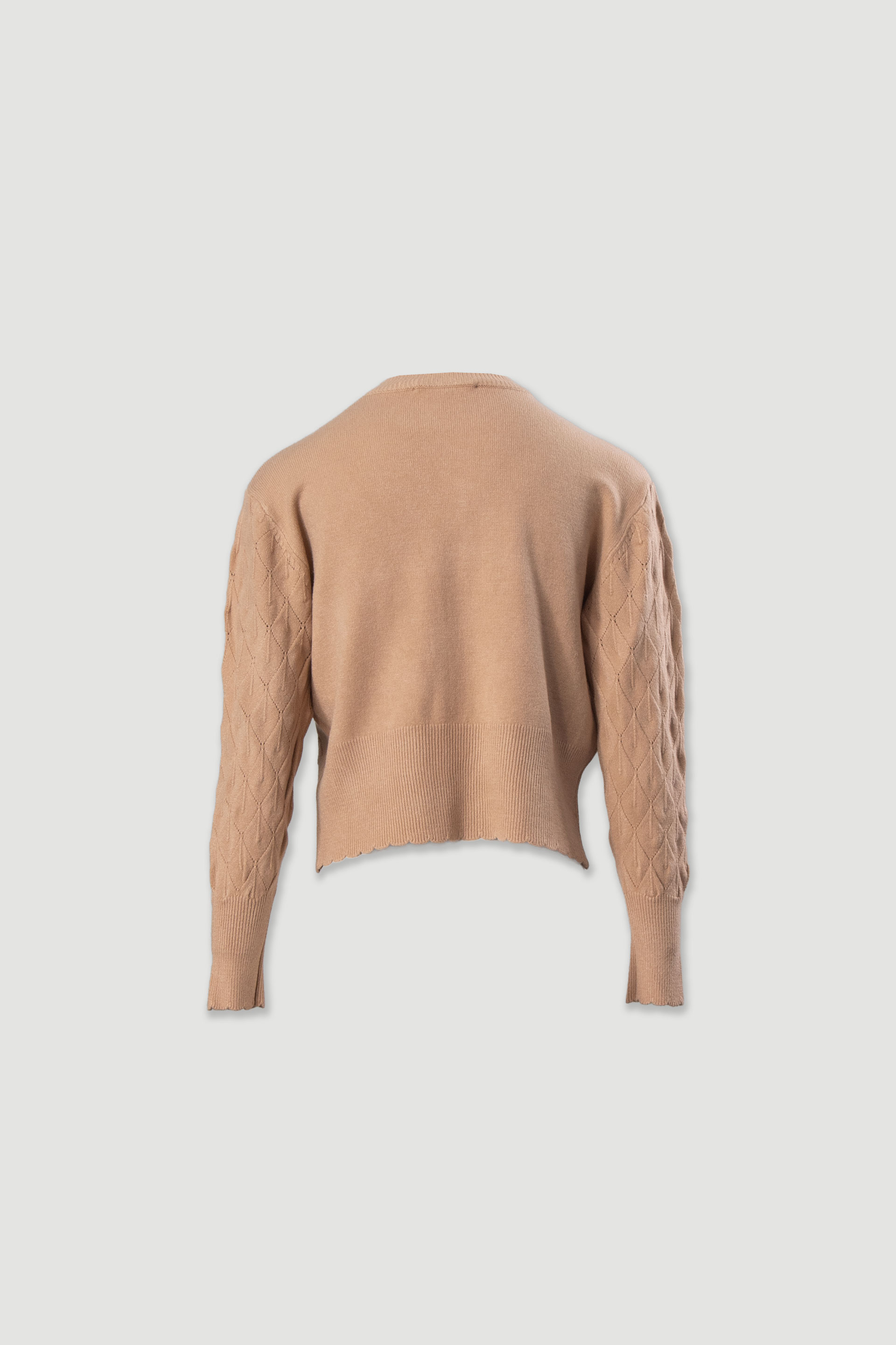 Textured knit sweater with geometric effect