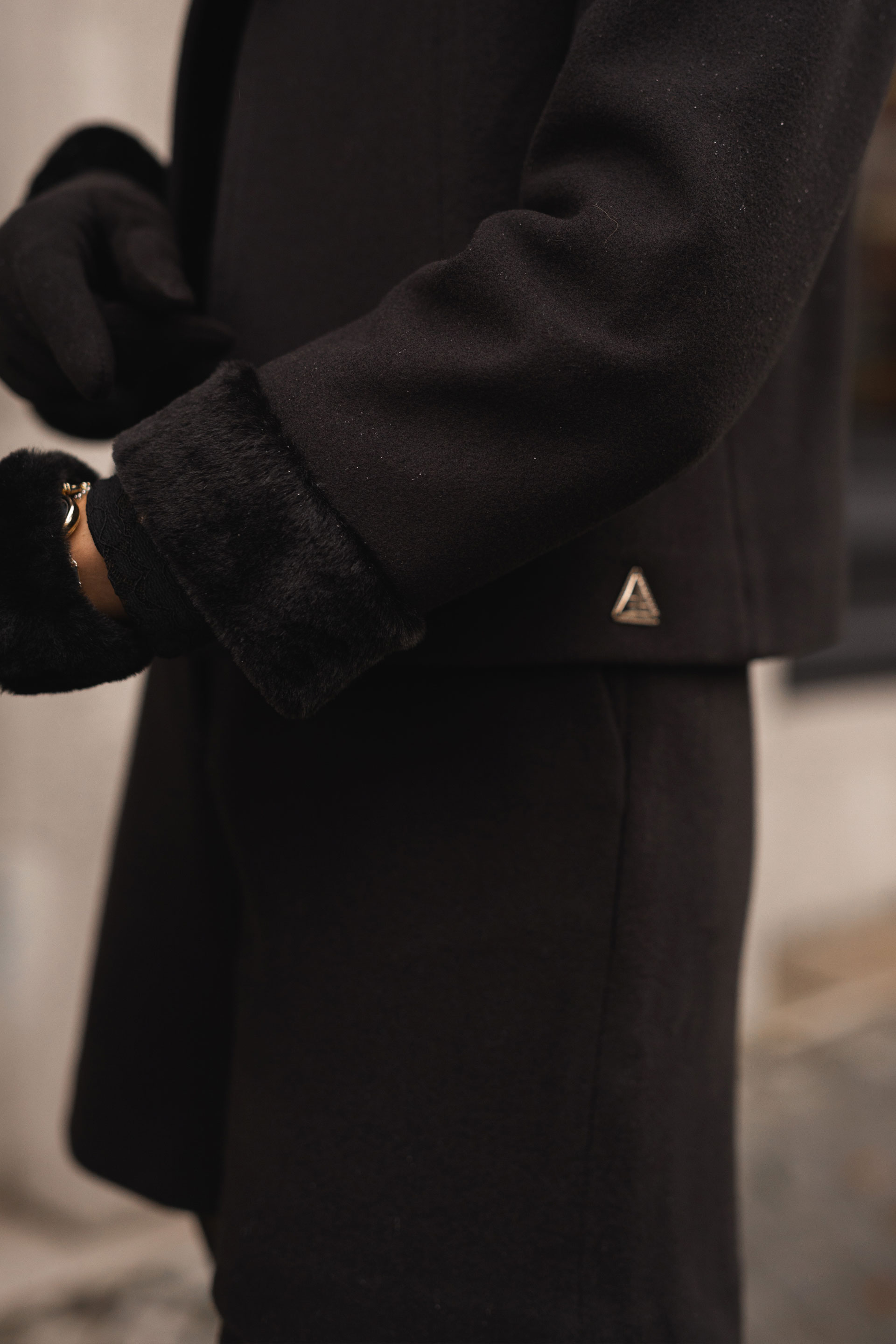 Short coat with bow collar and faux fur cuffs