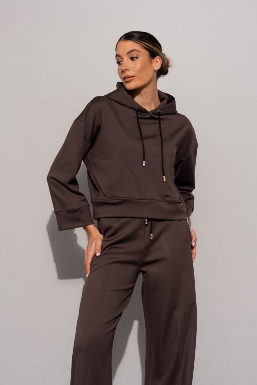 Weat court à capuche avec poches latérales Weat court à capuche avec poches latérales