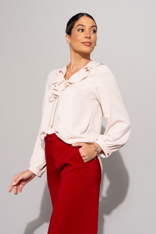 Túnica com folho e laço no decote Túnica com folho e laço no decote