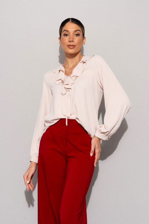 Túnica com folho e laço no decote Túnica com folho e laço no decote