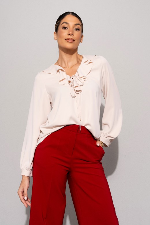 Túnica com folho e laço no decote Túnica com folho e laço no decote