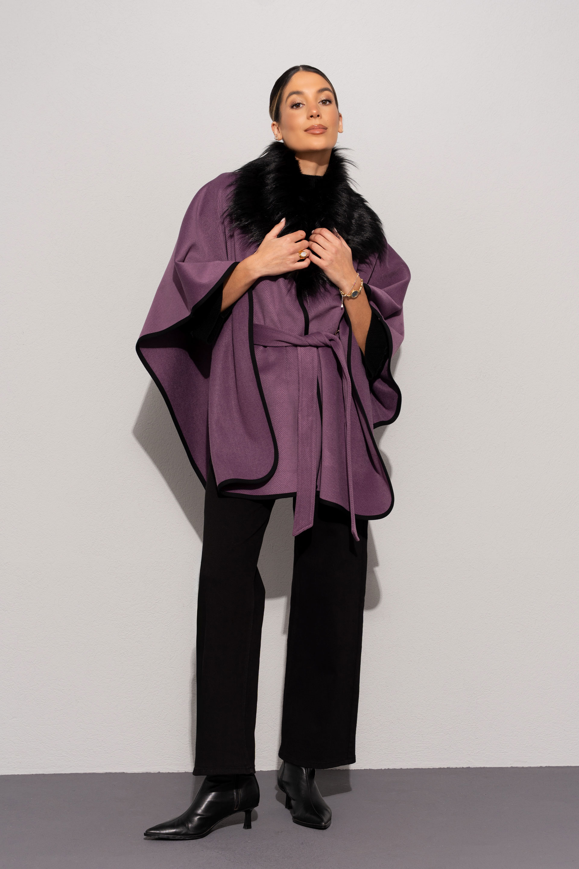 Cape with faux fur collar