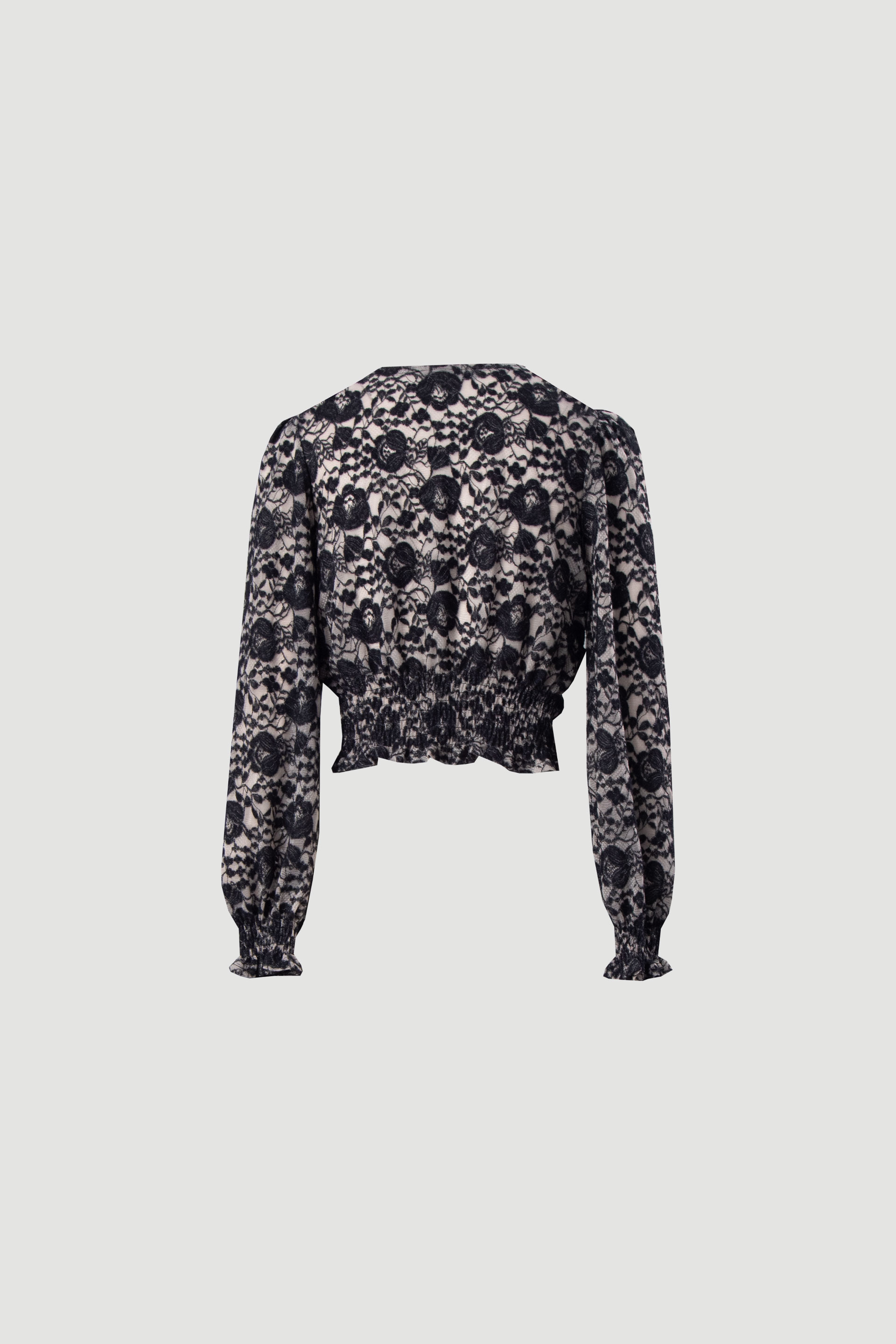 Top with floral detail and front knot