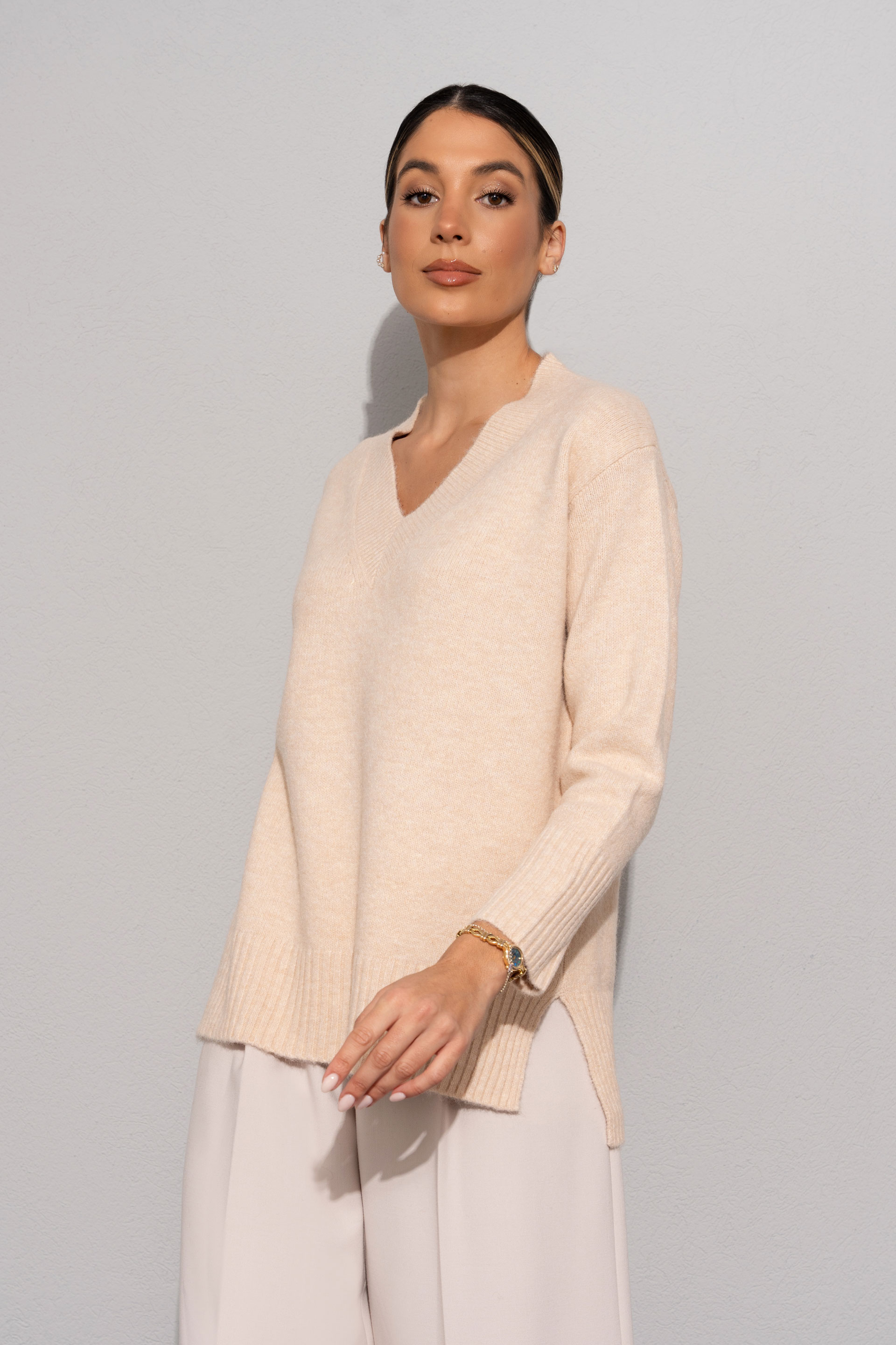 Knit sweater with v-neckline