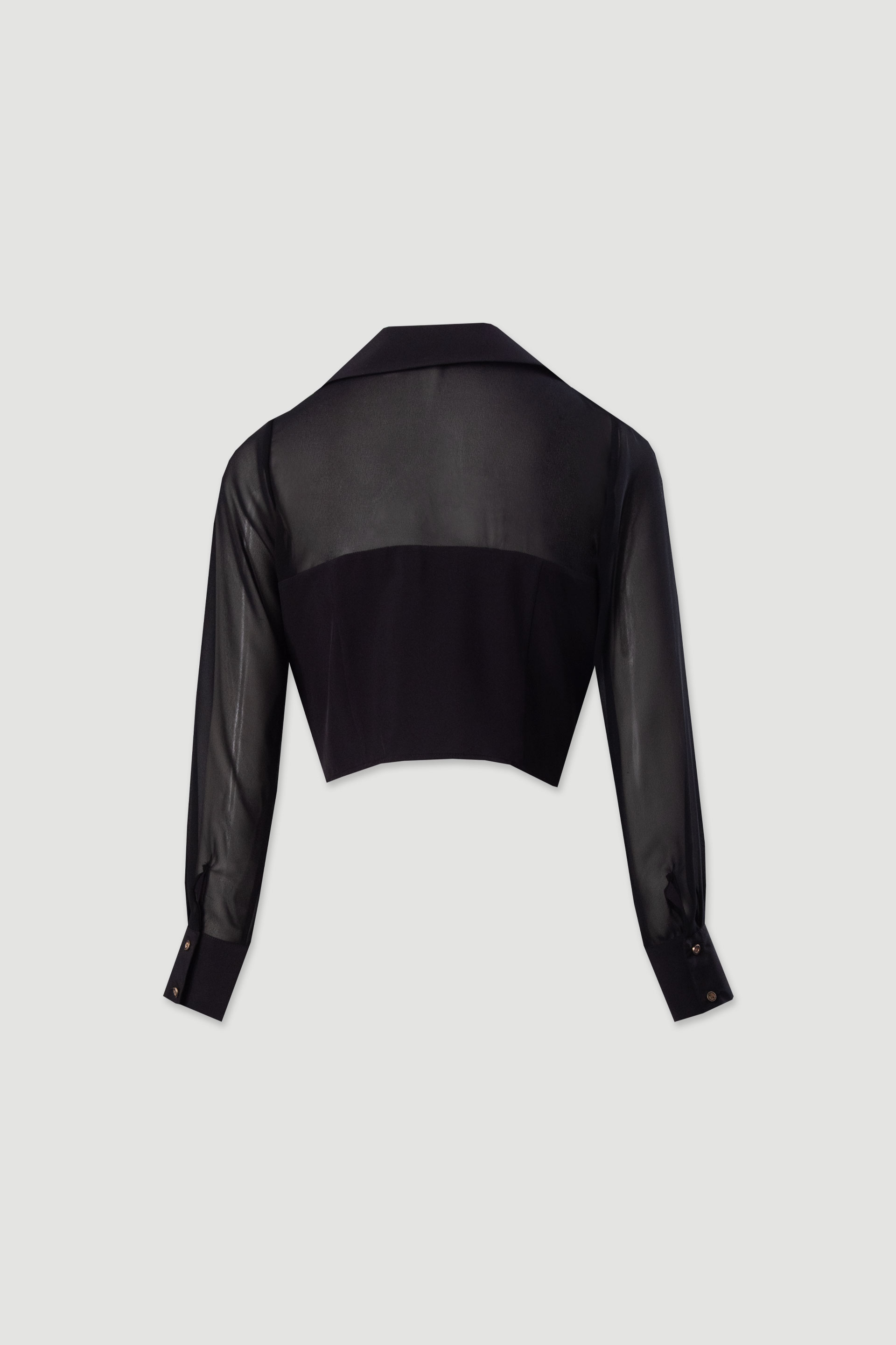 Blouse courte avec transparences et boutons