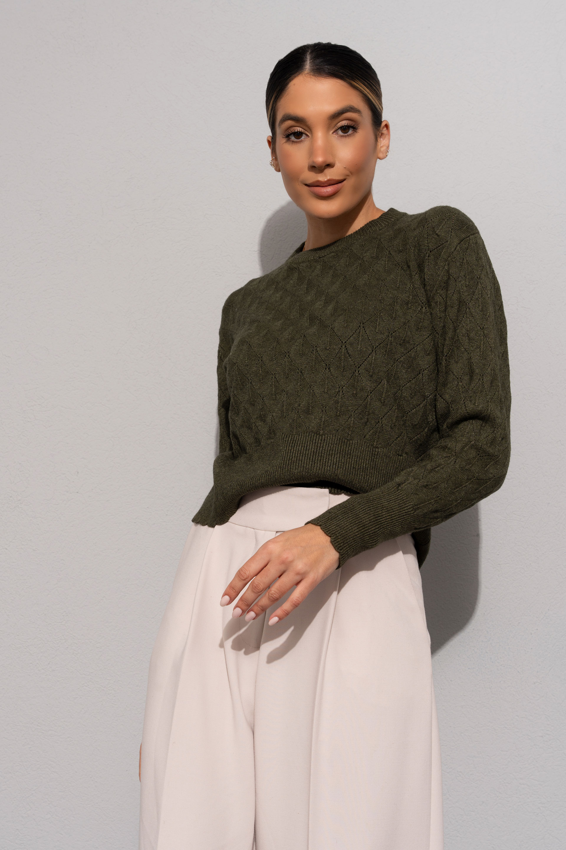 Textured knit sweater with geometric effect