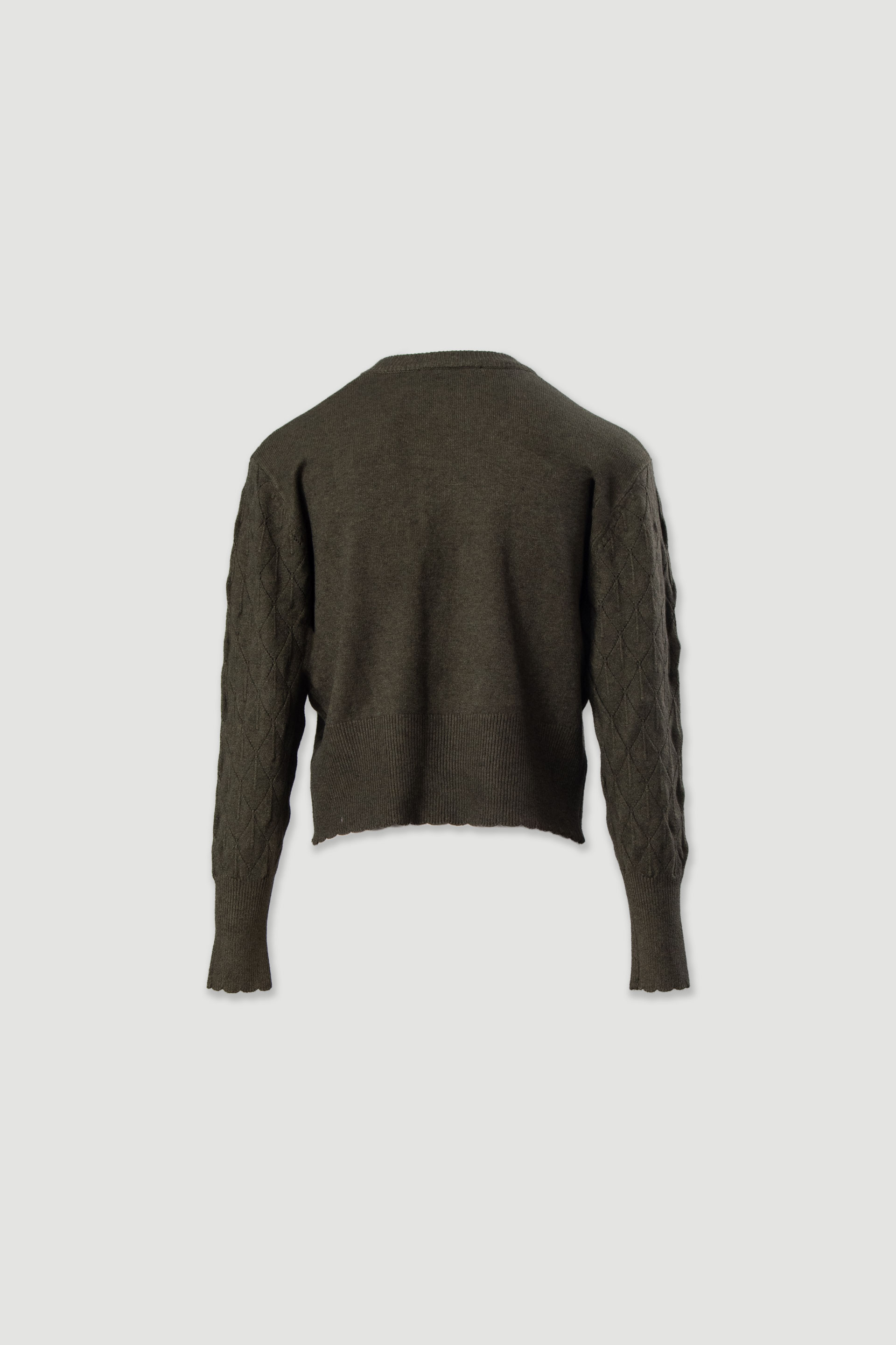 Textured knit sweater with geometric effect