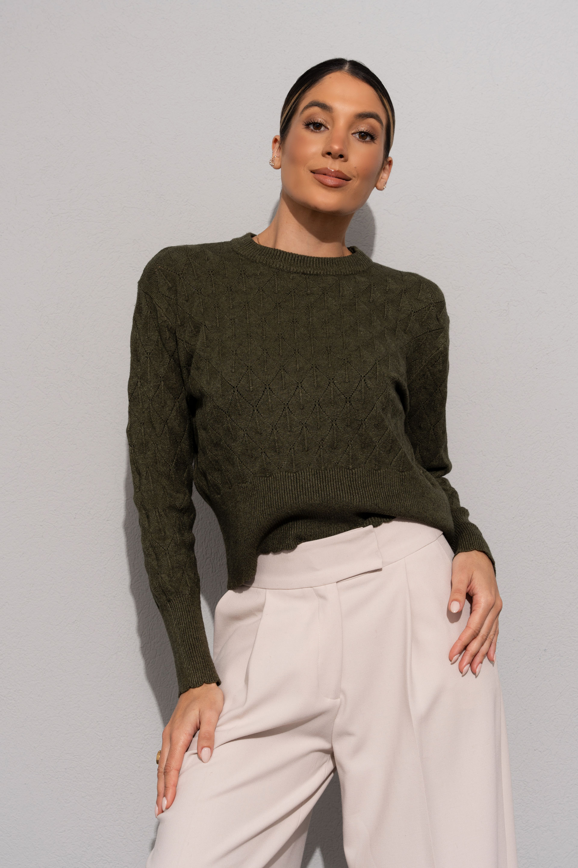 Textured knit sweater with geometric effect