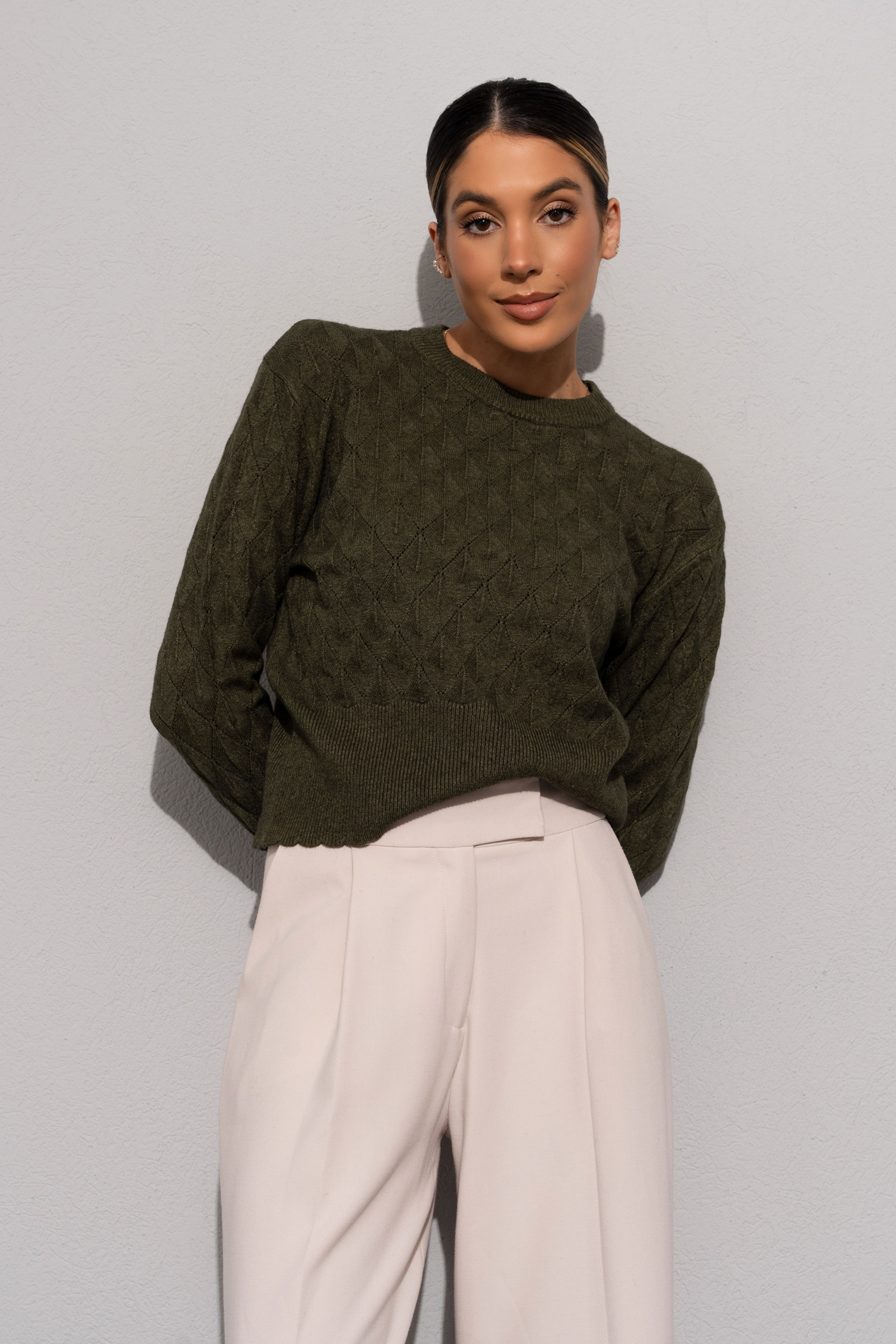 Textured knit sweater with geometric effect