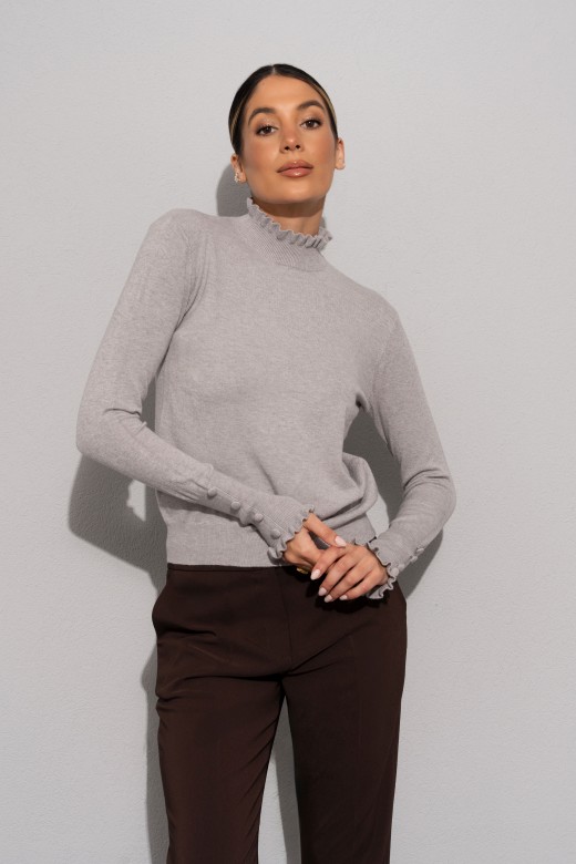 Knit sweater with wavy collar and buttons Knit sweater with wavy collar and buttons