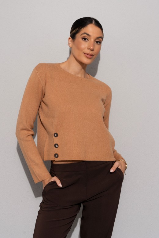 Short knitted sweater with personalized buttons Short knitted sweater with personalized buttons