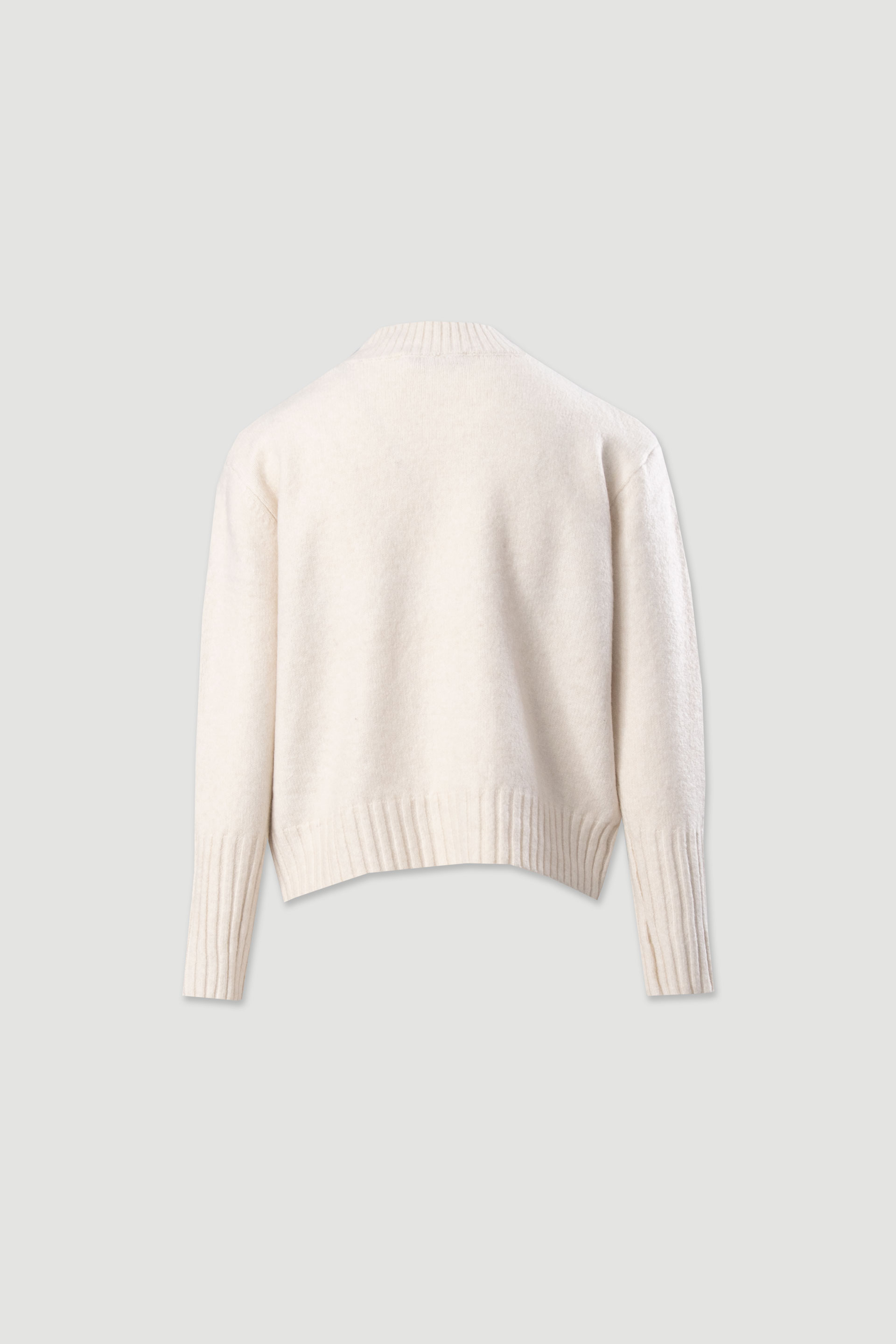 Camisola de malha com detalhe de relevo na frente