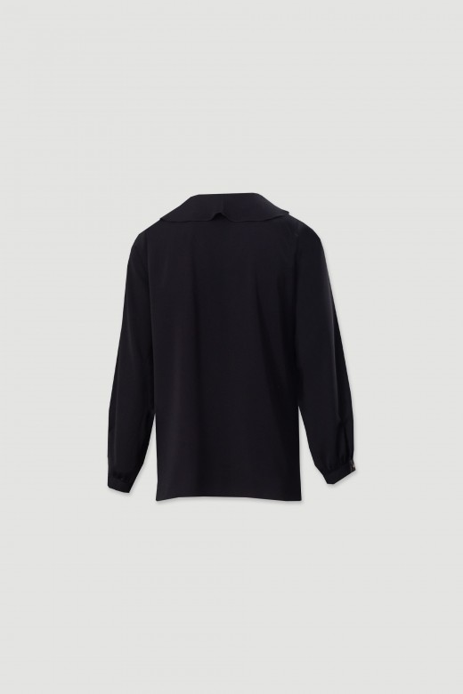 Blouse with ruffle and tie neckline Blouse with ruffle and tie neckline