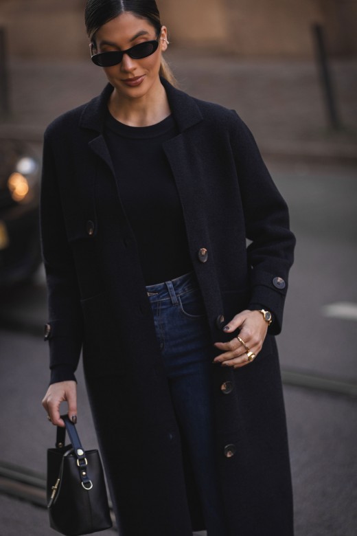 Long knitted coat with buttons