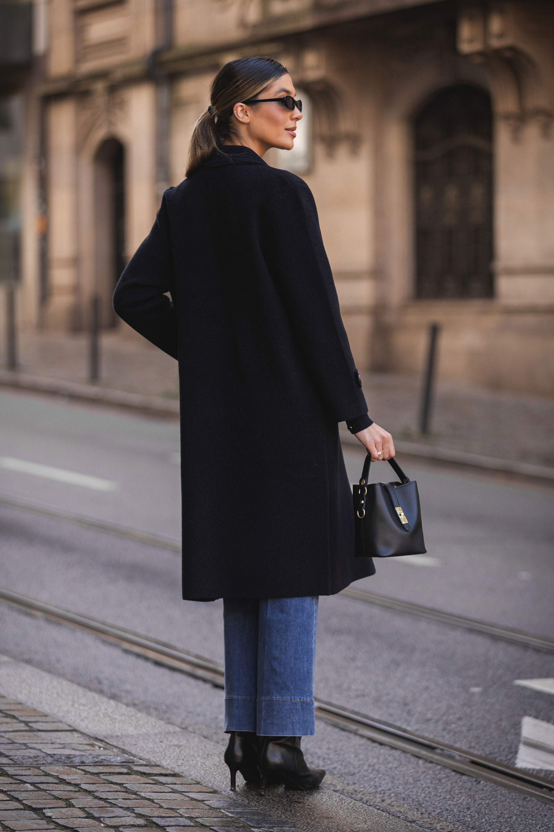 Long knitted coat with buttons