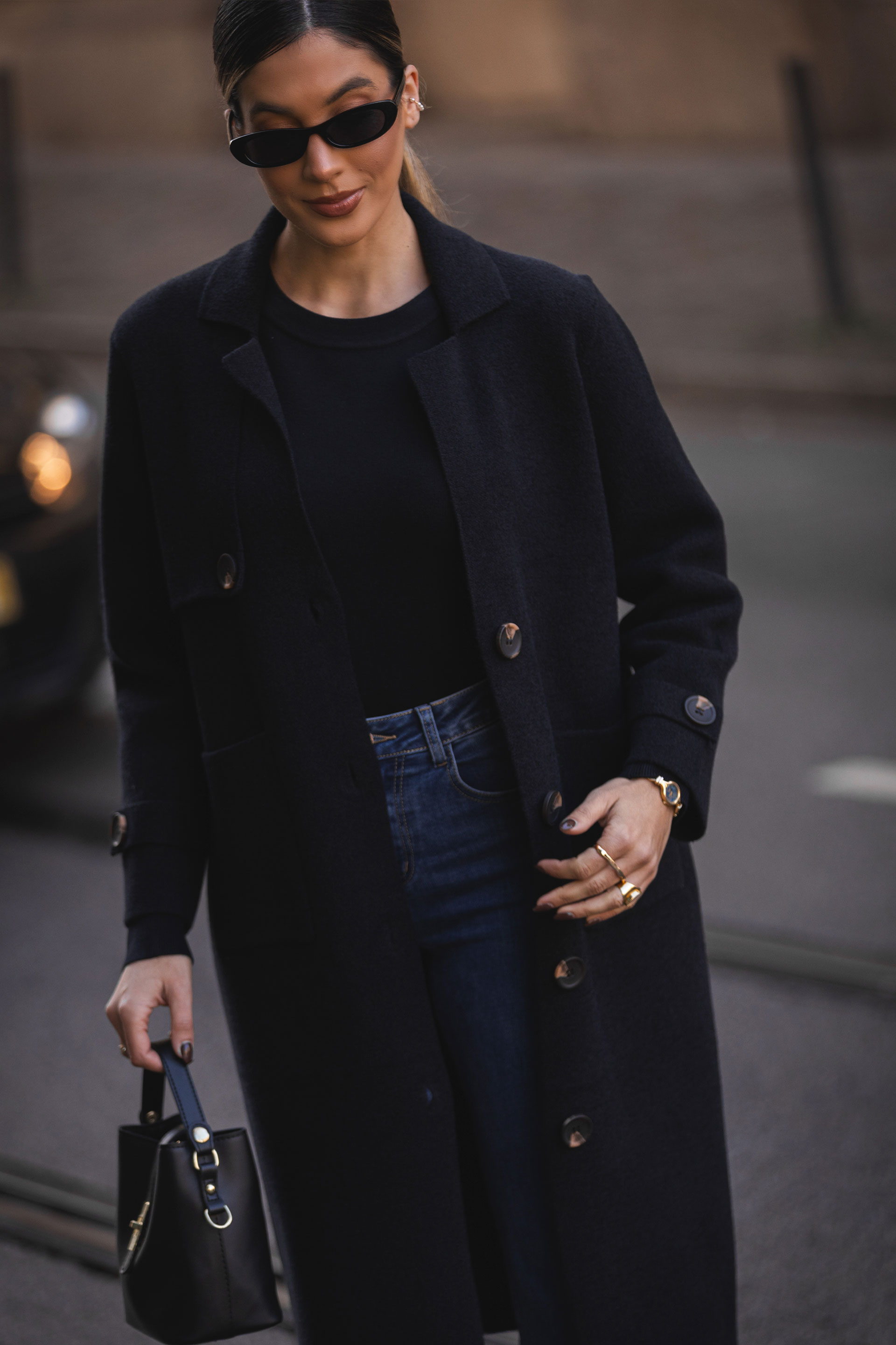 Long knitted coat with buttons