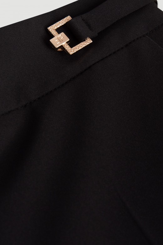 Classic wide-leg trousers with customised metallic button