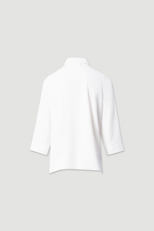 Asymmetrical tunic with keyhole neckline