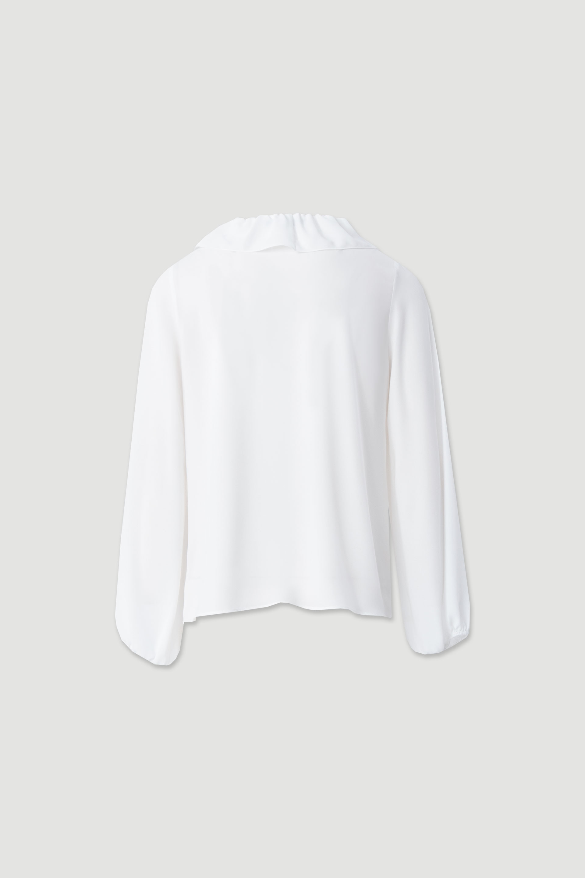 Flowy blouse with ruffle neckline