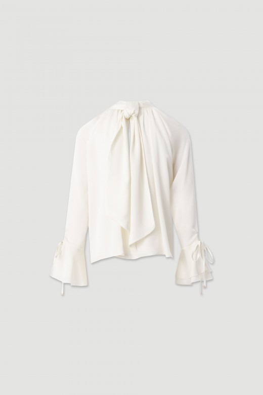 Fluid tunic with high neck and bow