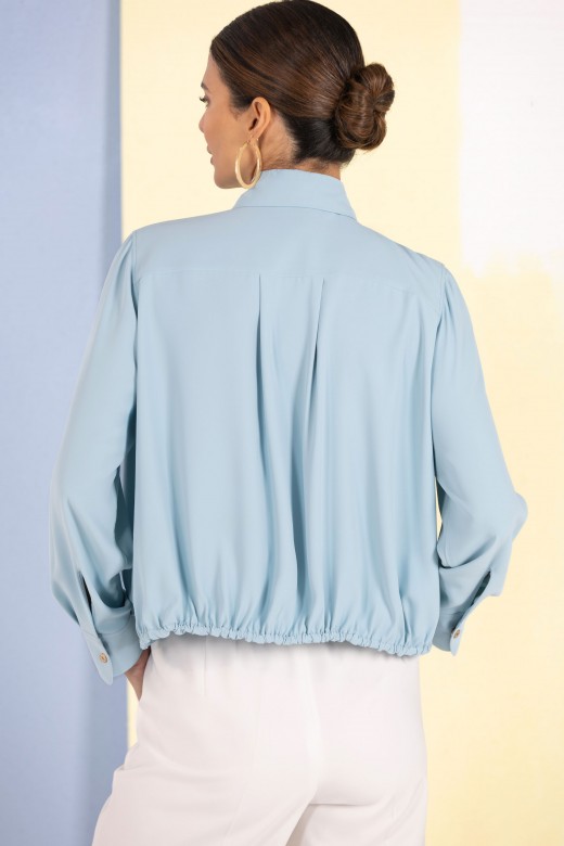 Fluid blouse with adjustable drawstring Fluid blouse with adjustable drawstring