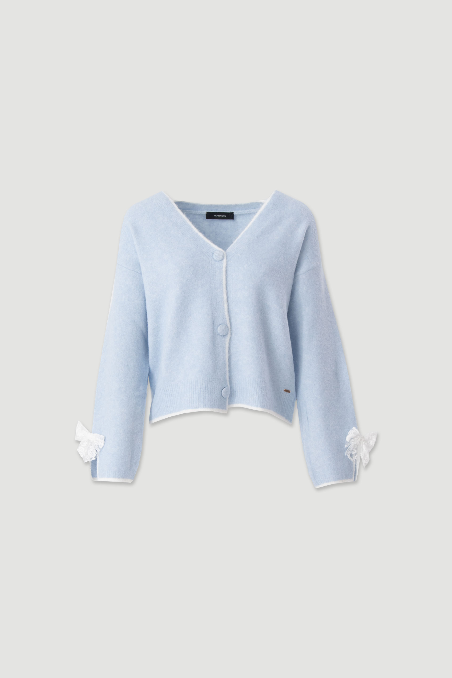 Knit cardigan with bow detail on the cuffs