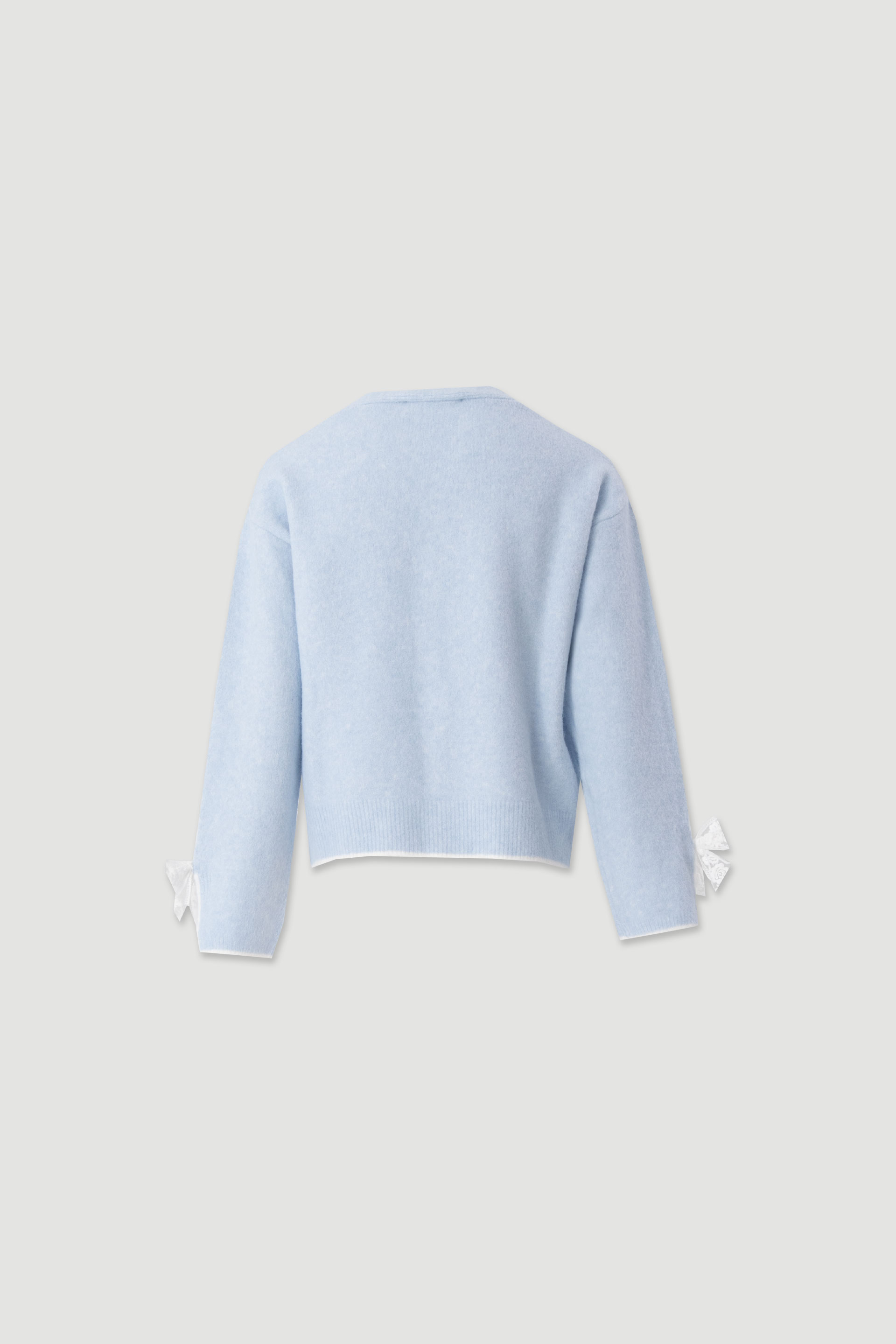 Knit cardigan with bow detail on the cuffs