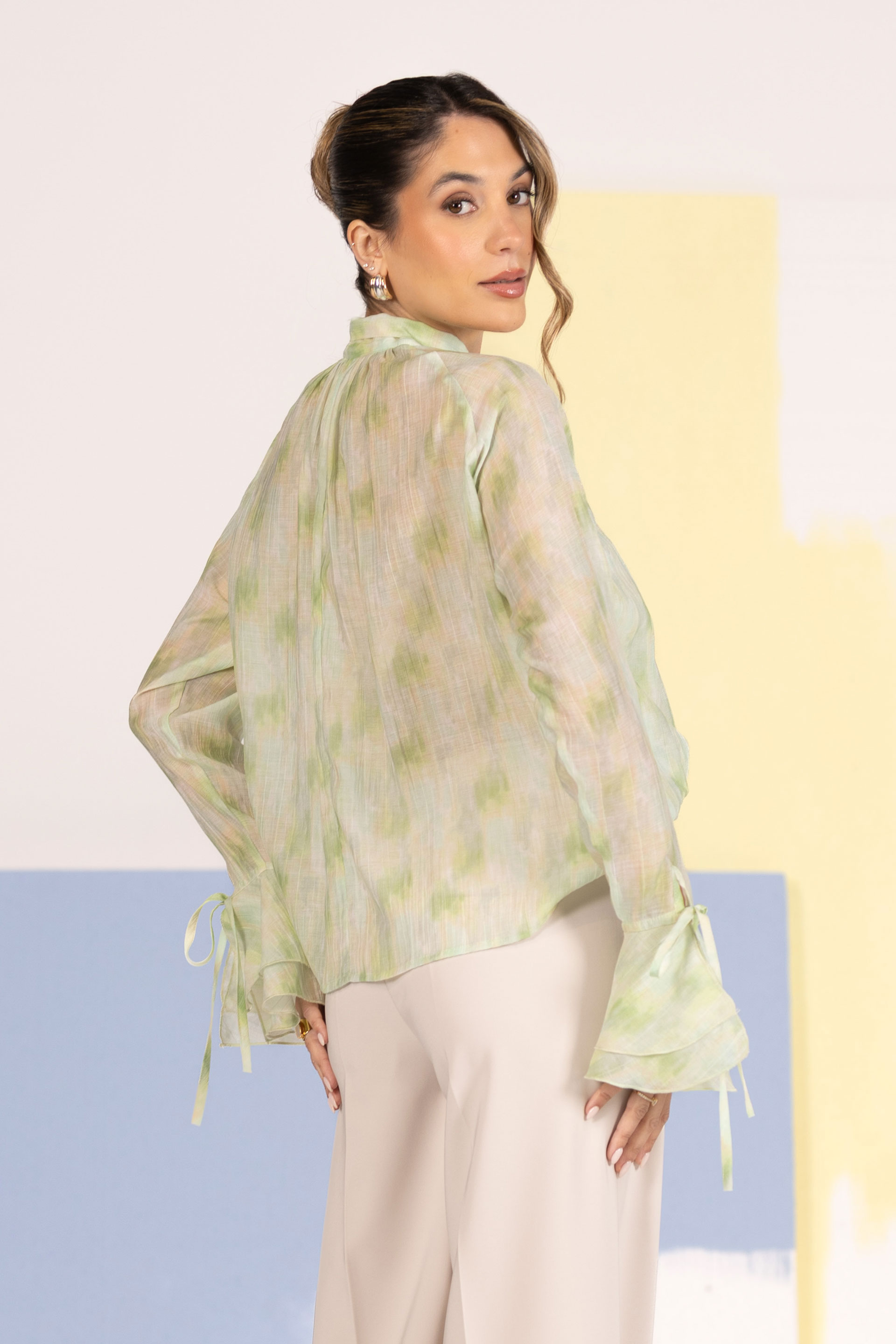 Fluid tunic with bow neckline