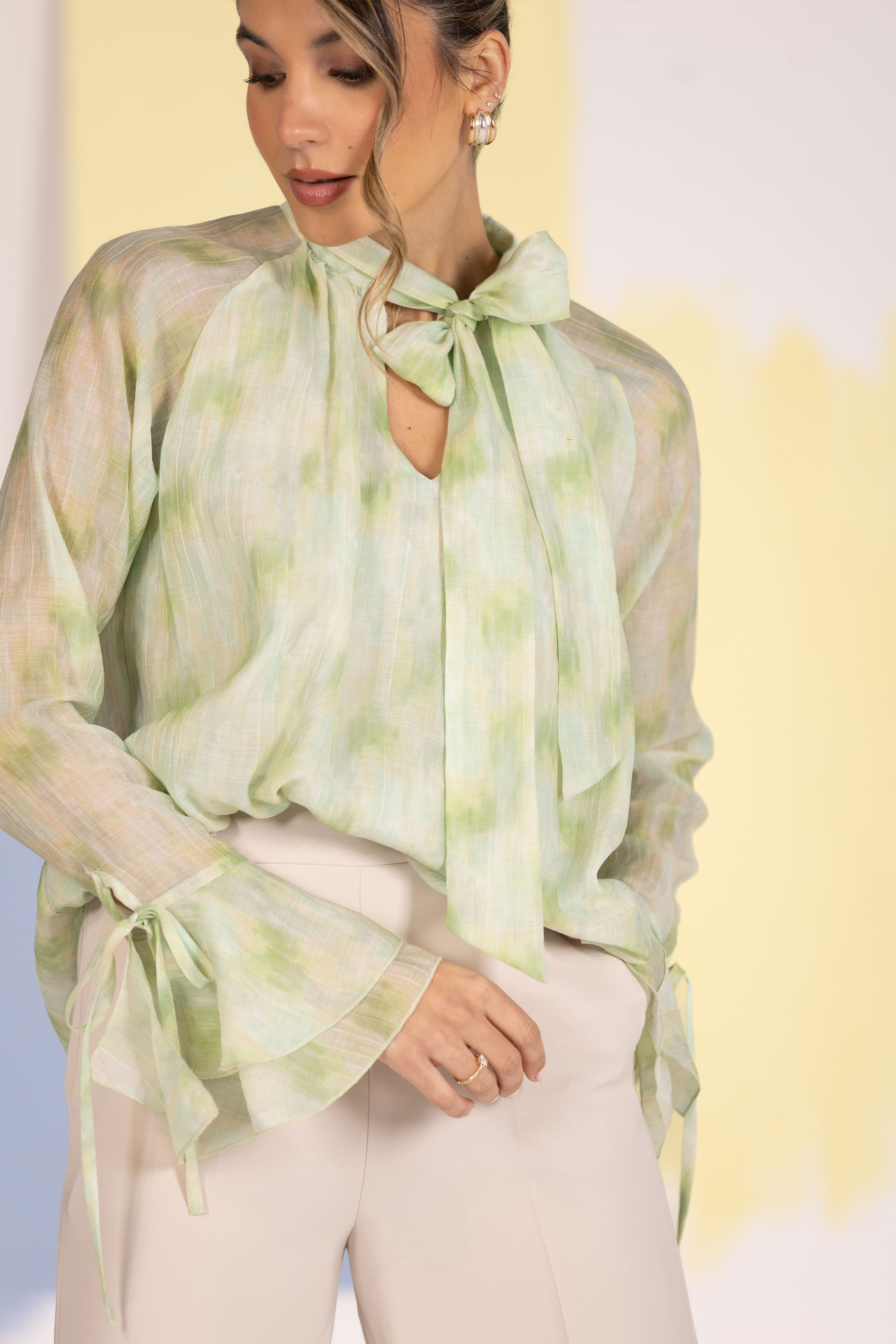 Fluid tunic with bow neckline