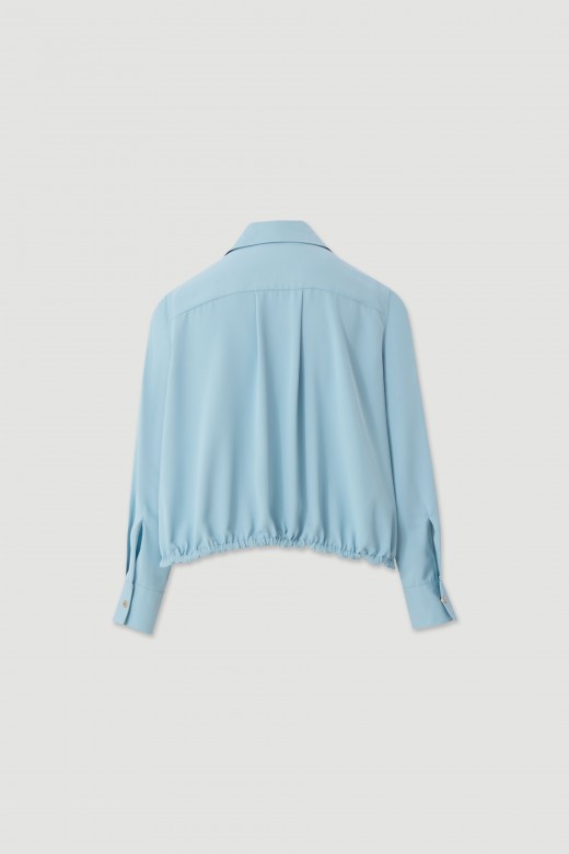 Fluid blouse with adjustable drawstring