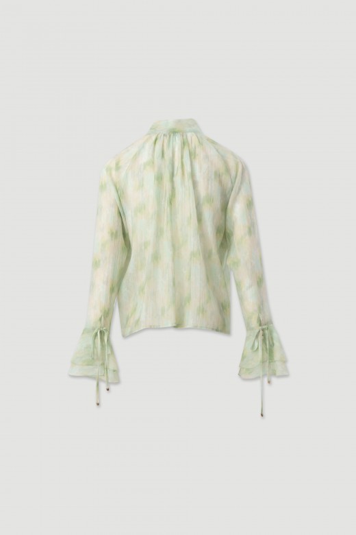 Fluid tunic with bow neckline