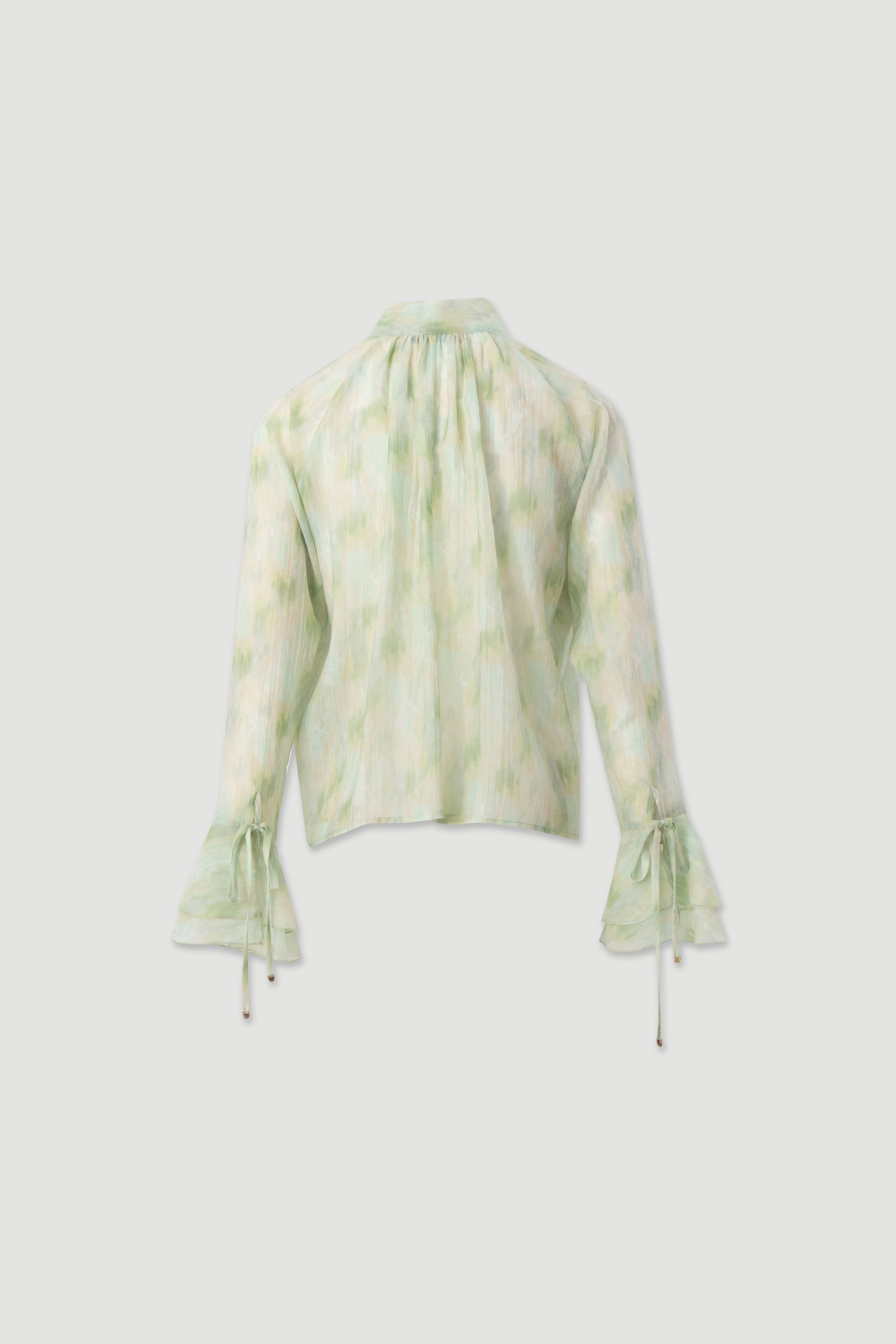 Fluid tunic with bow neckline