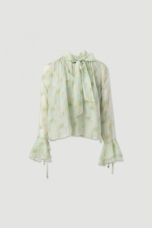 Fluid tunic with bow neckline