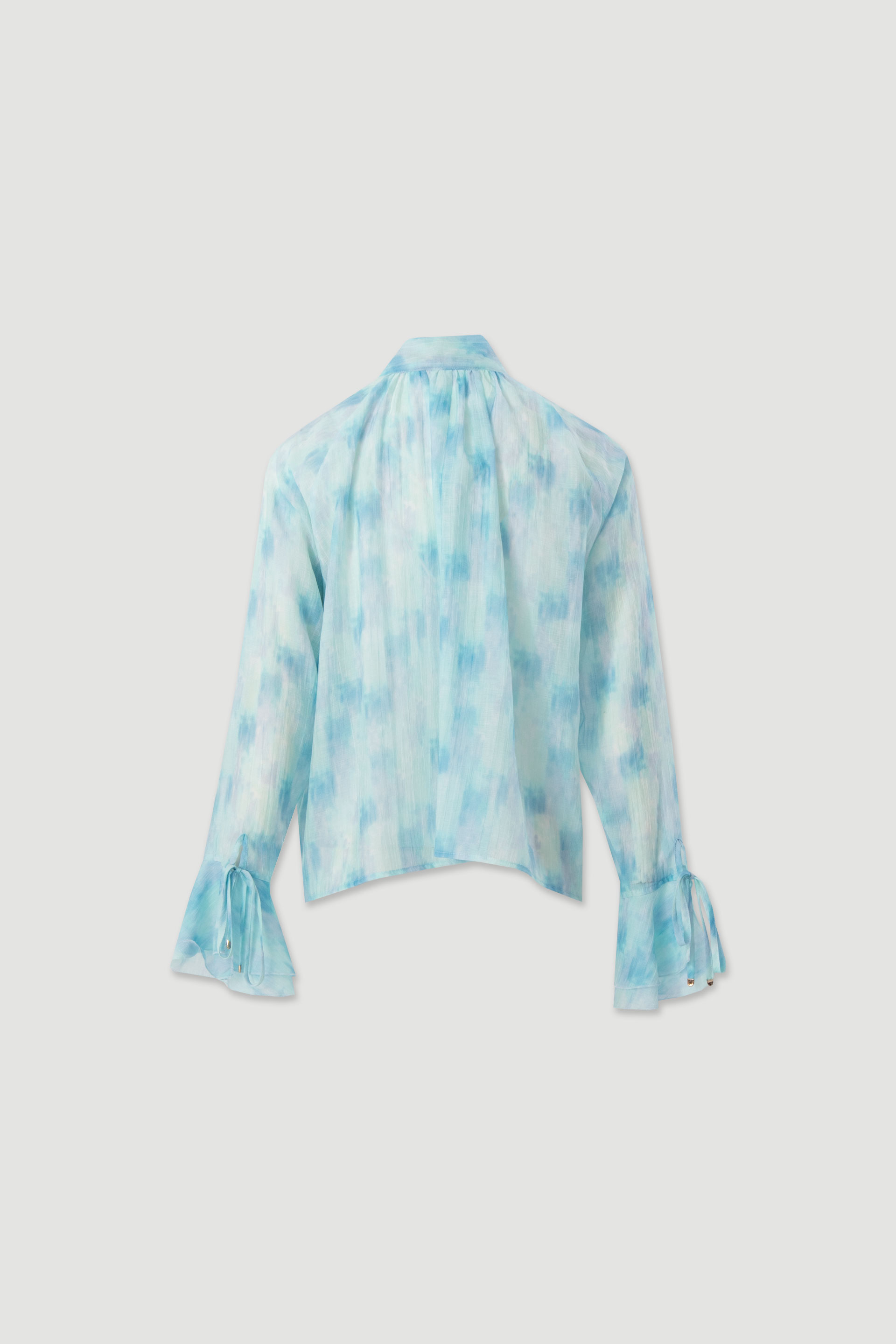 Fluid tunic with bow neckline