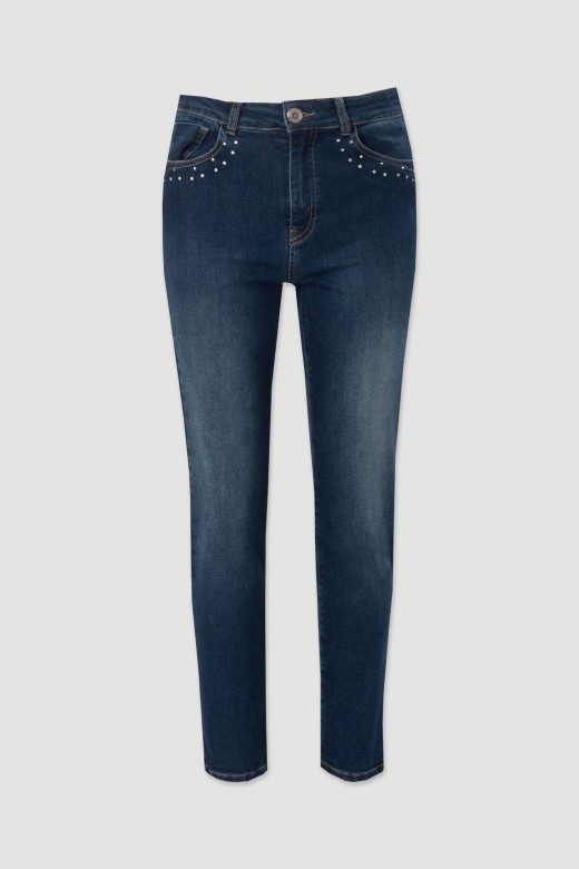 Skinny jeans with metallic transfers on the pockets
