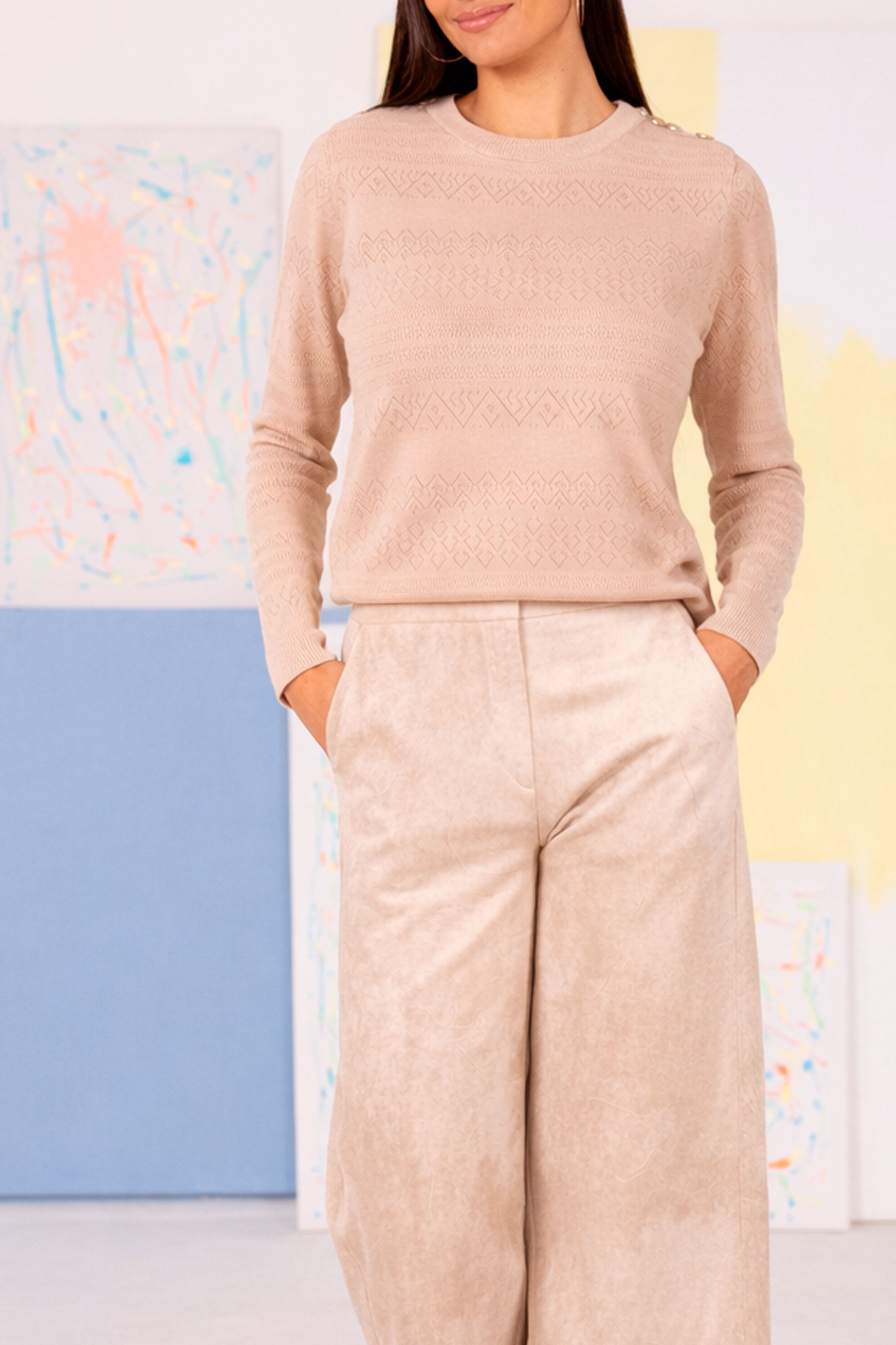 Textured knit sweater with decorative shoulder buttons