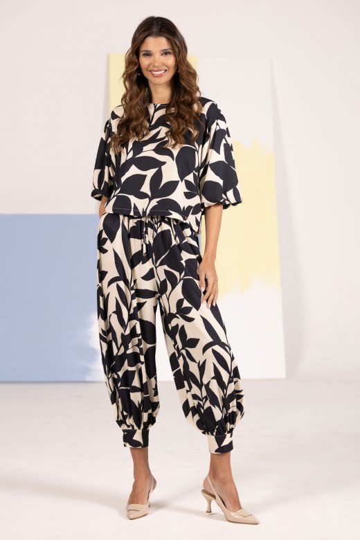 Printed trousers with cuffs and waist tie