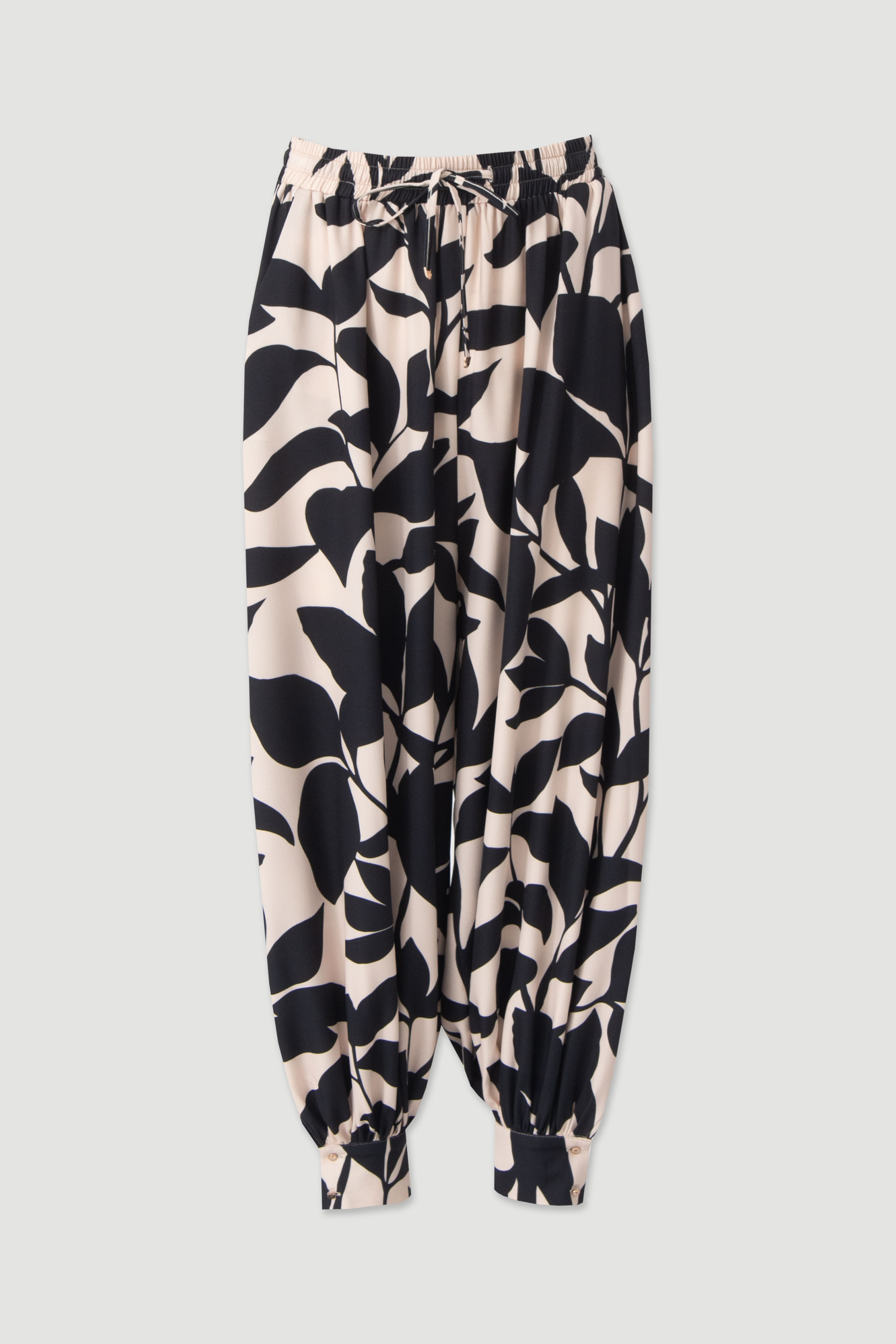 Printed trousers with cuffs and waist tie