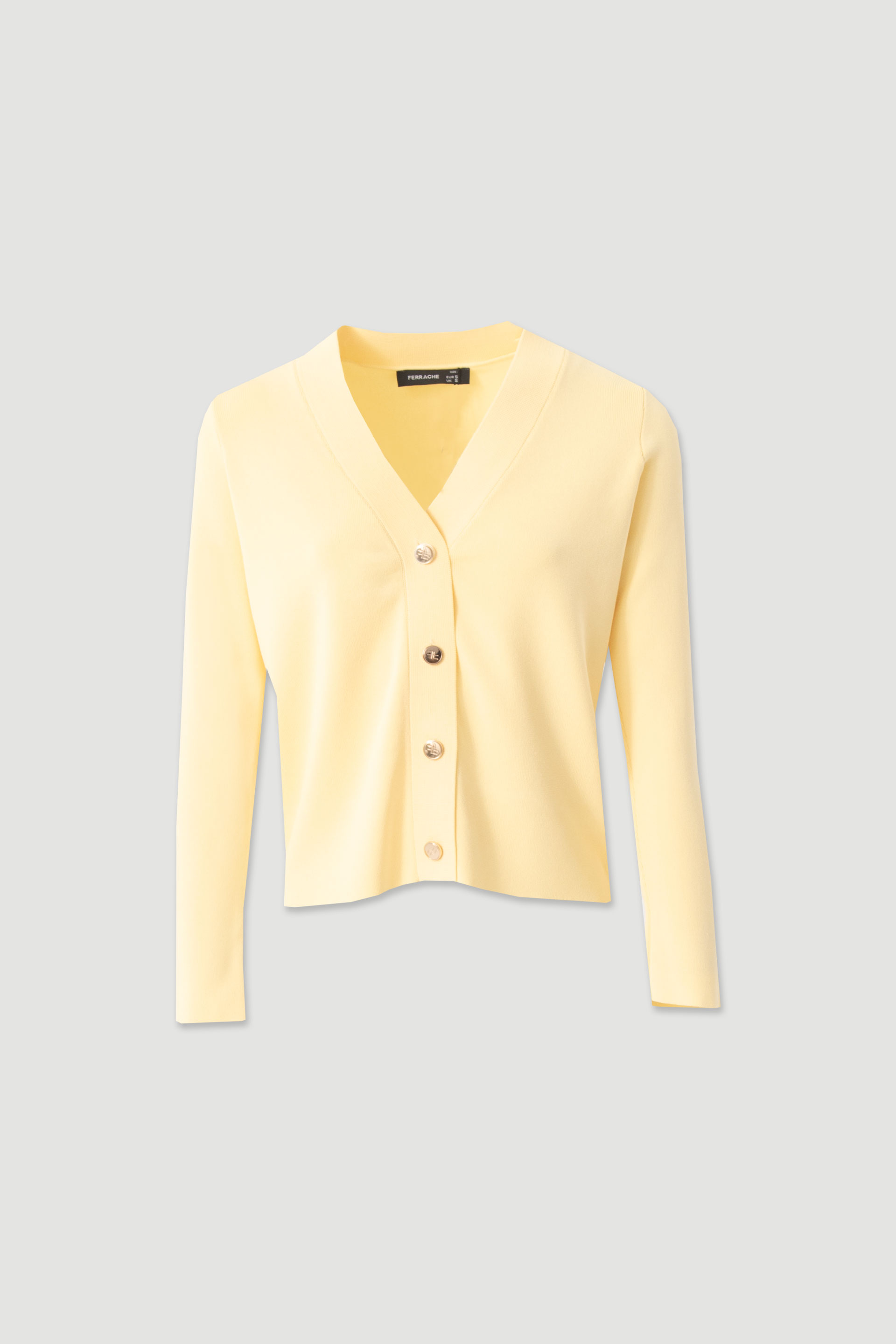 Short knitted cardigan with custom buttons