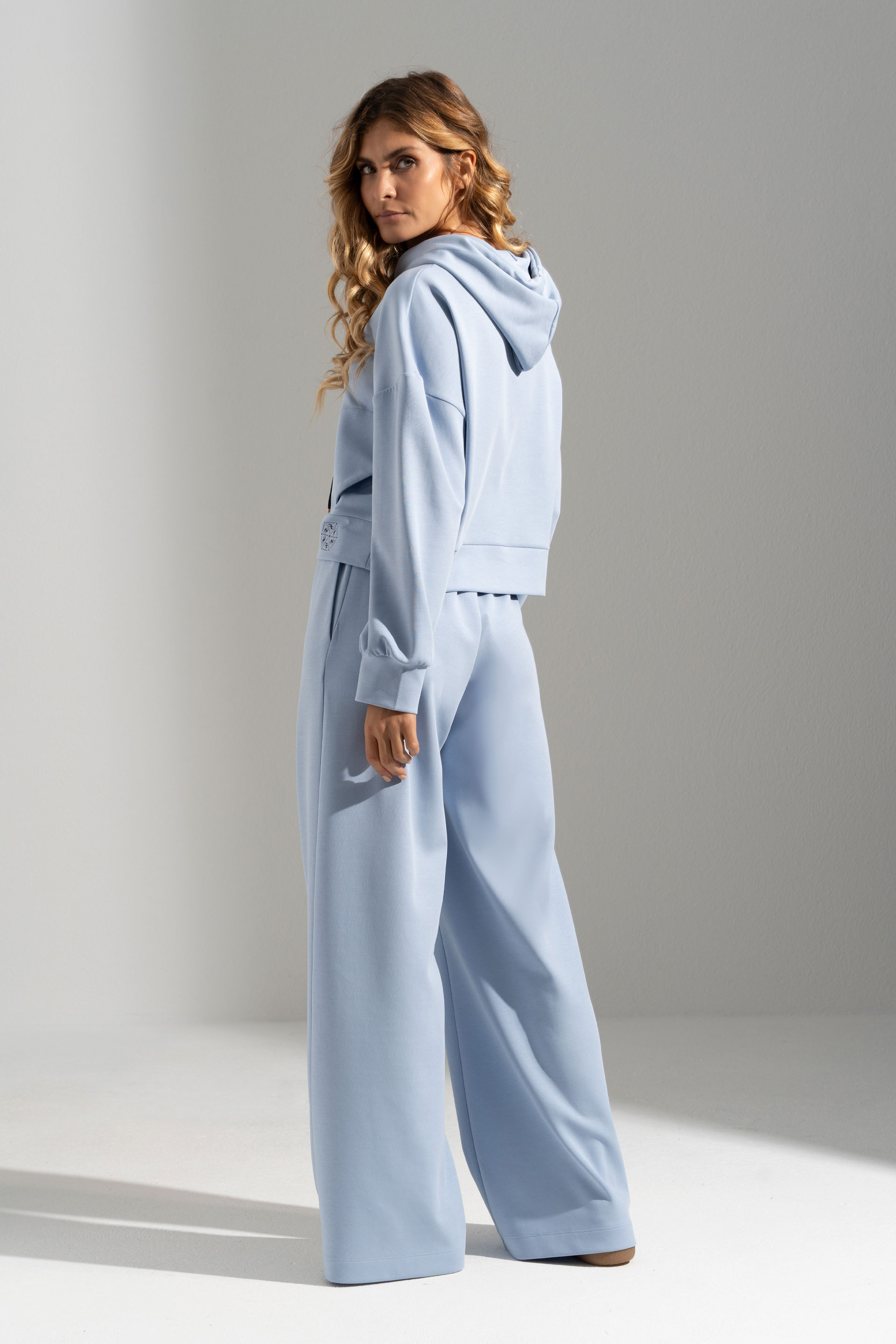 Wide-leg knit trousers with front design detail