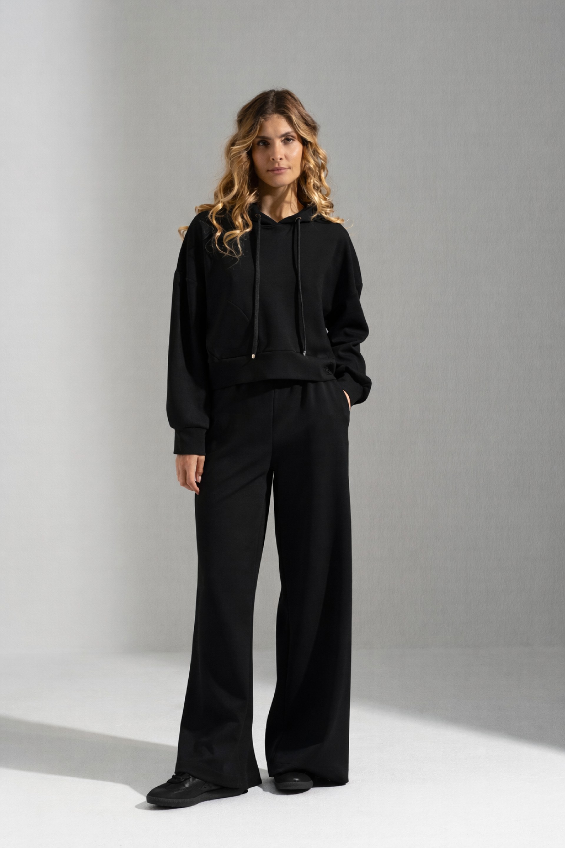 Wide-leg knit trousers with front design detail