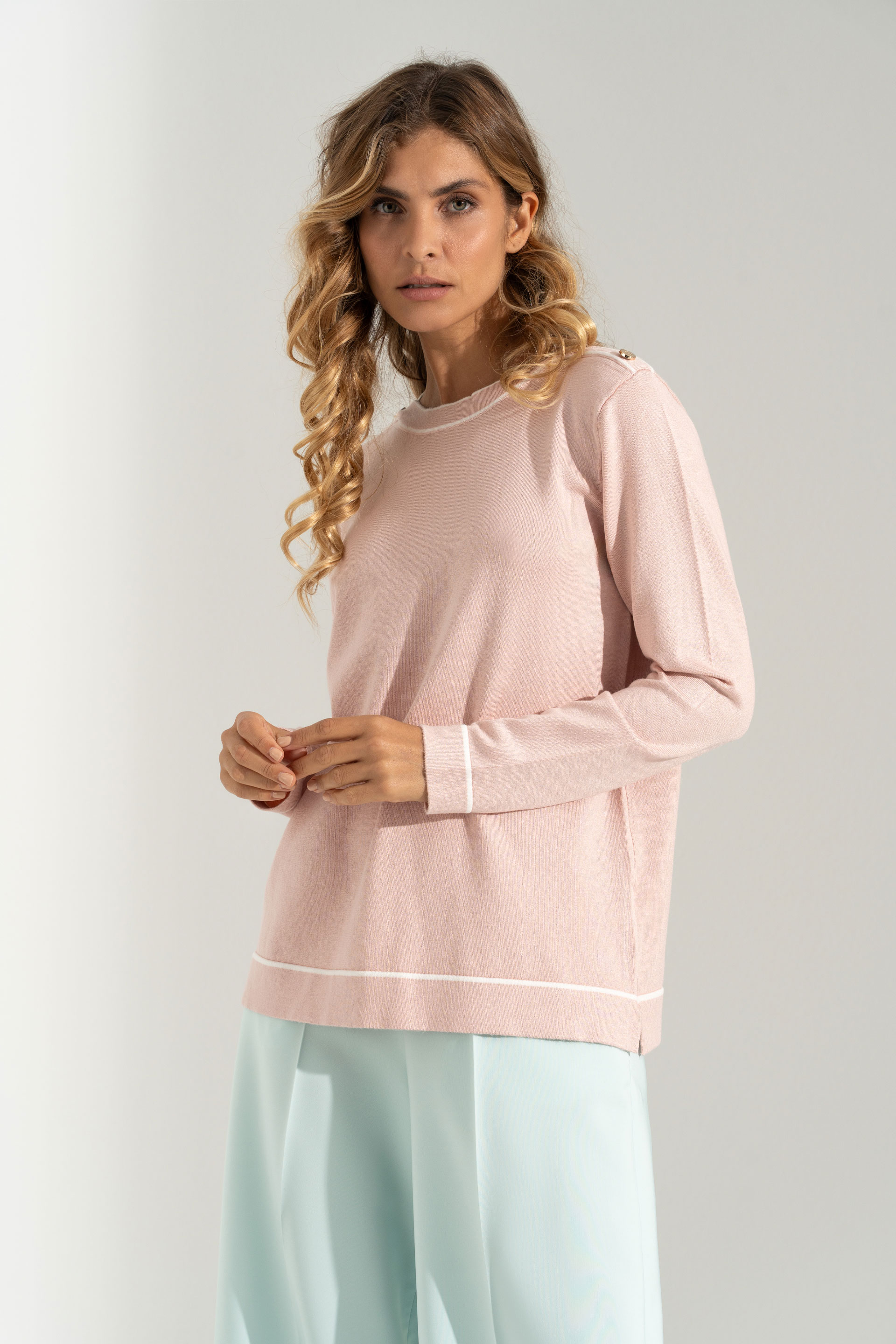 Knit sweater with shoulder buttons