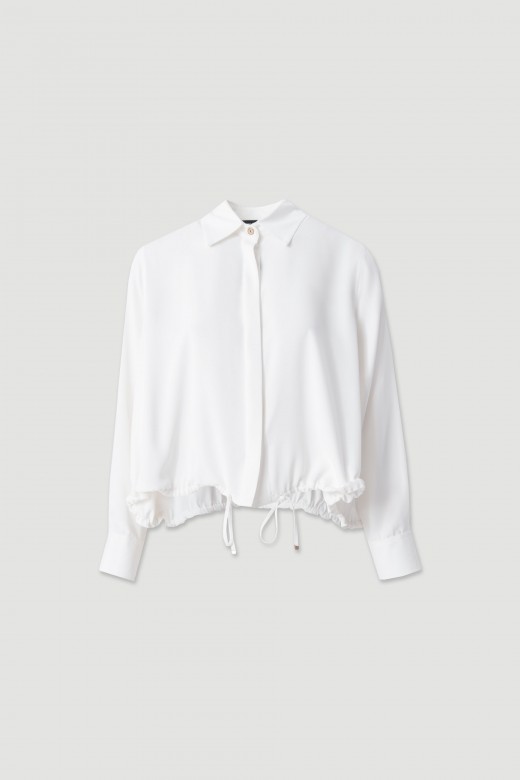 Fluid blouse with adjustable drawstring Fluid blouse with adjustable drawstring