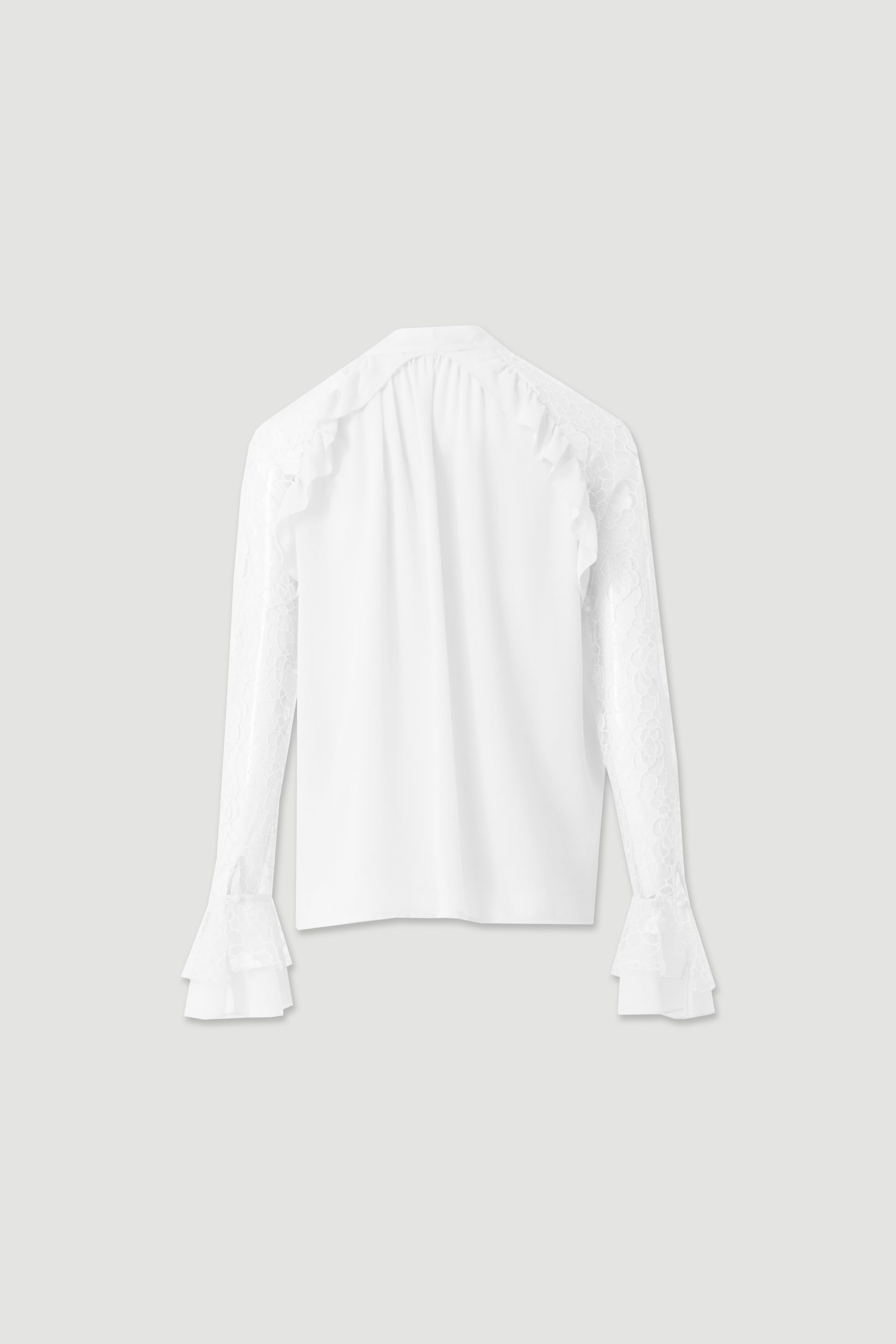 Blouse with bow and lace sleeves