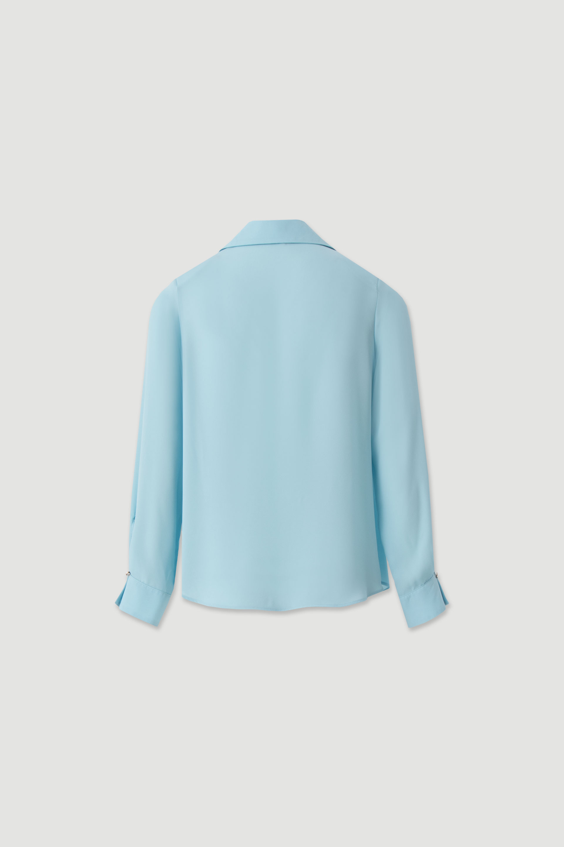 Blouse with draped neckline
