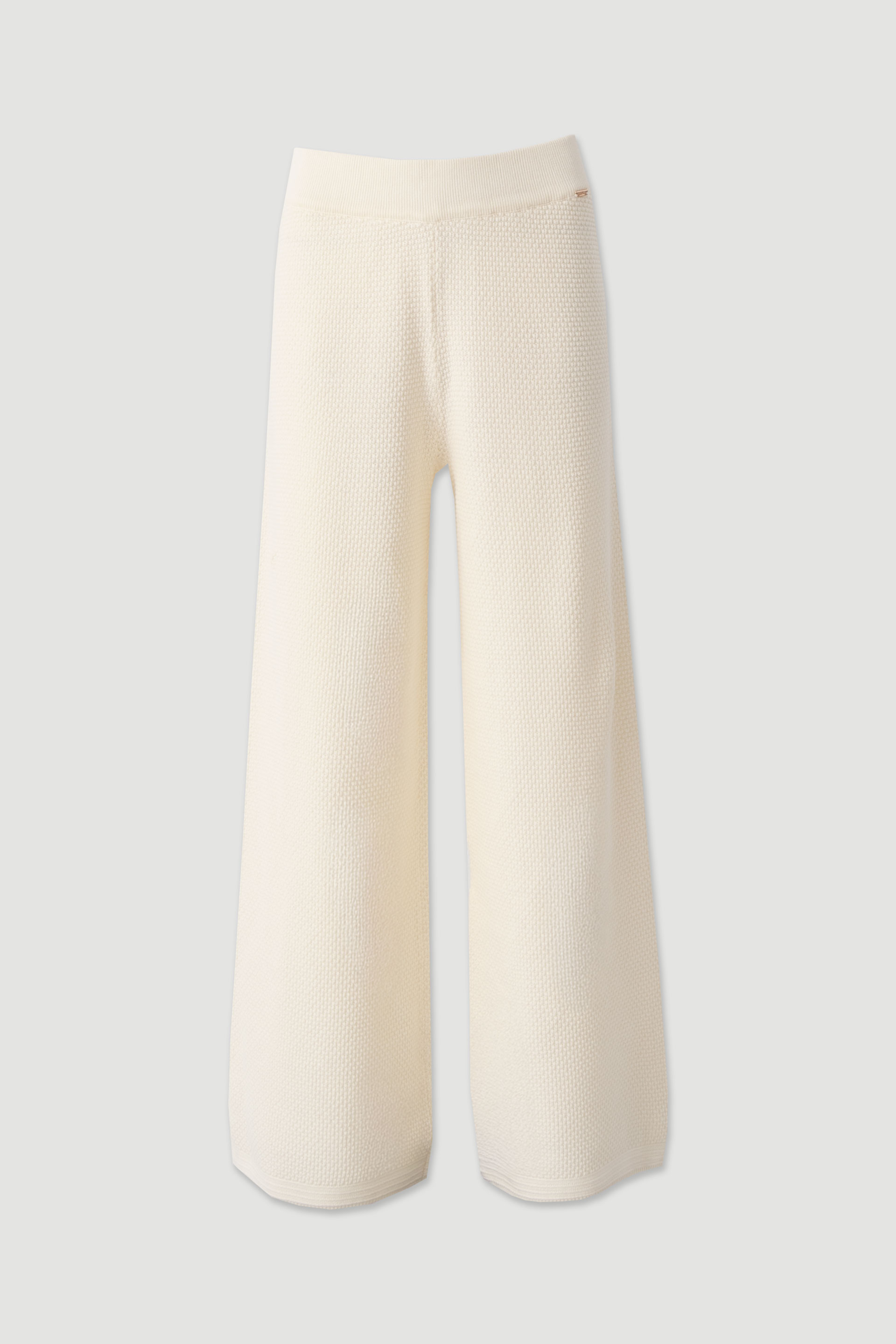 Perforated knit trousers in 100% cotton