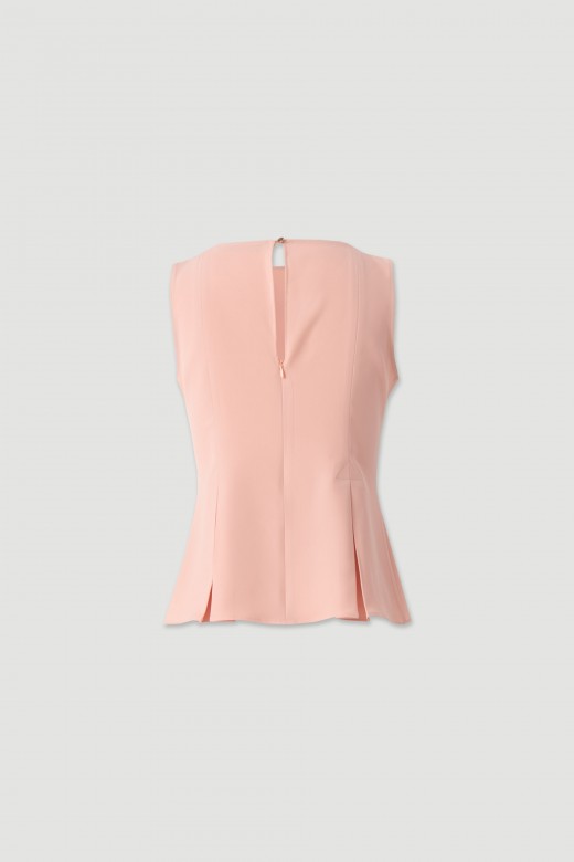 Sleeveless flowing top with side slits Sleeveless flowing top with side slits